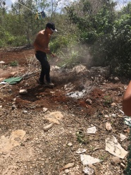 Eco Camping's cochinita unearthing